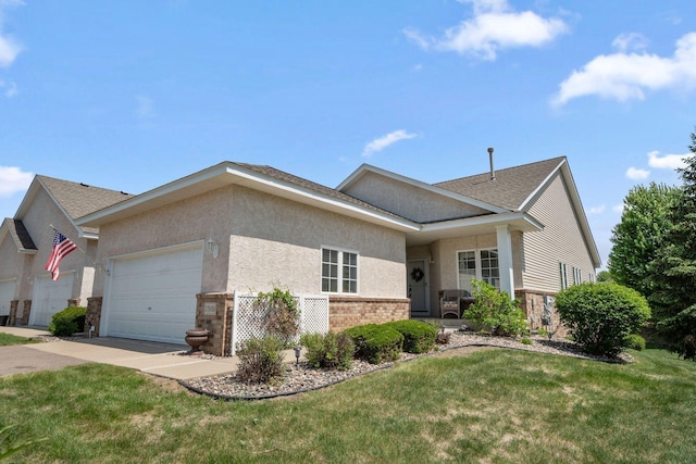 17830 Glasgow Way, Lakeville, MN 55044 - ranch-style home featuring an attached garage, driveway, brick siding, a front yard, and stucco siding