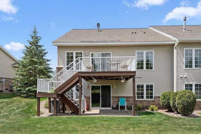 17830 Glasgow Way, Lakeville, MN 55044 - rear view of property featuring stairs, a patio, a lawn, brick siding, and a shingled roof