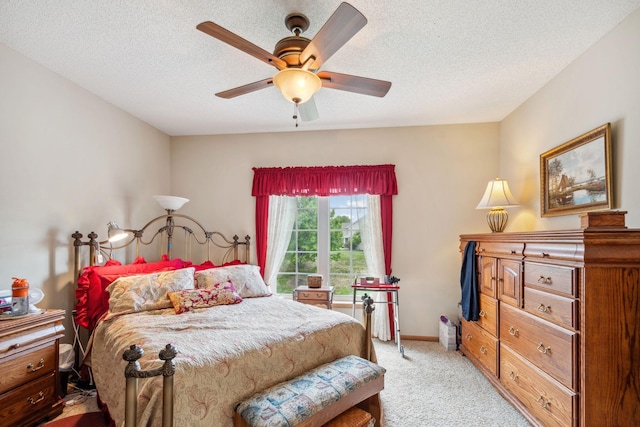 17830 Glasgow Way, Lakeville, MN 55044 - bedroom featuring light carpet, a textured ceiling, a ceiling fan, and baseboards
