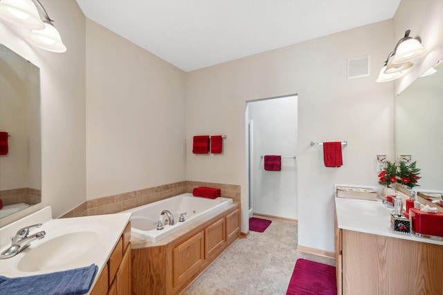 17830 Glasgow Way, Lakeville, MN 55044 - full bath featuring vanity, a garden tub, and a shower stall