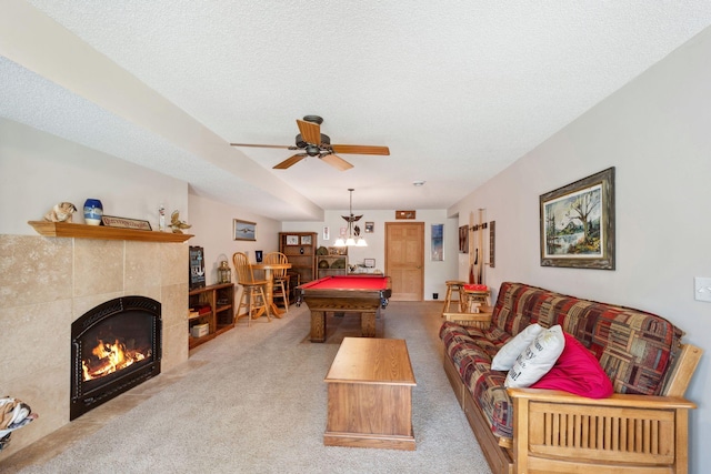 17830 Glasgow Way, Lakeville, MN 55044 - rec room with pool table, carpet flooring, a tiled fireplace, ceiling fan, and a textured ceiling