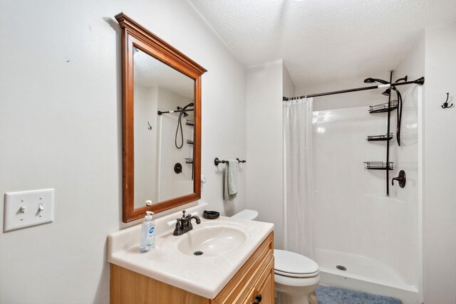 17830 Glasgow Way, Lakeville, MN 55044 - bathroom with toilet, vanity, a textured ceiling, and a shower with shower curtain