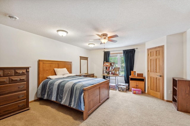 17830 Glasgow Way, Lakeville, MN 55044 - bedroom featuring light carpet, a textured ceiling, and ceiling fan