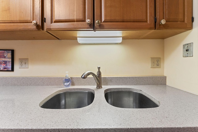 1425 28th St Unit 510, Minneapolis, MN 55408 - detailed view of a sink and brown cabinets