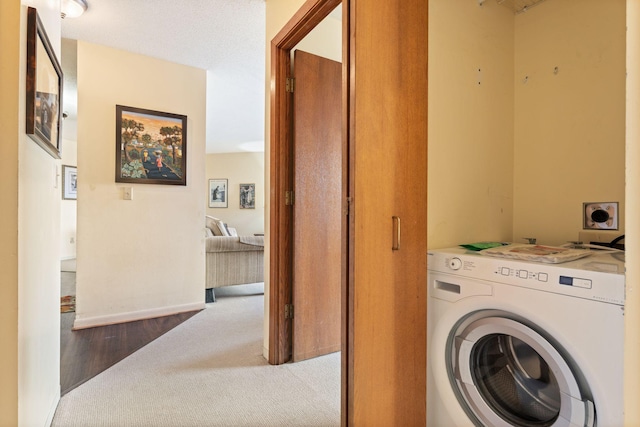 1425 28th St Unit 510, Minneapolis, MN 55408 - laundry room featuring washer / dryer, carpet floors, and baseboards
