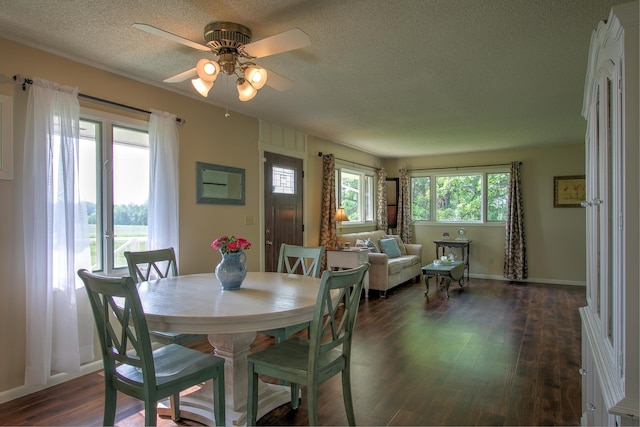 2509 Jade St, Mora, MN 55051 - dining space with a textured ceiling, dark wood-style flooring, and ceiling fan