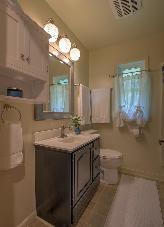 2509 Jade St, Mora, MN 55051 - bathroom featuring tile patterned floors and vanity