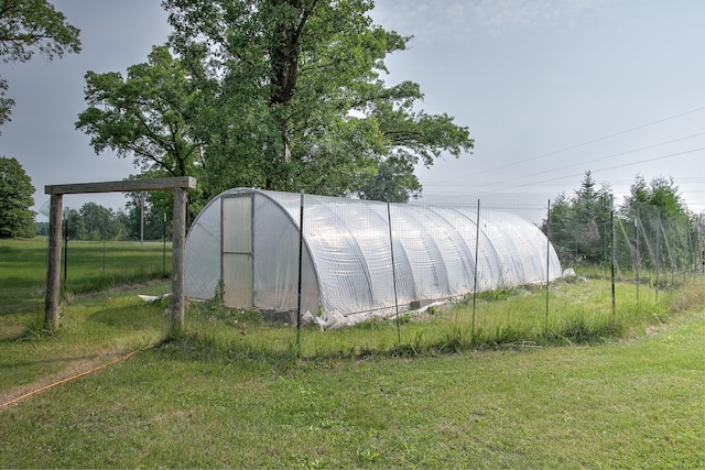 2509 Jade St, Mora, MN 55051 - view of greenhouse featuring a lawn