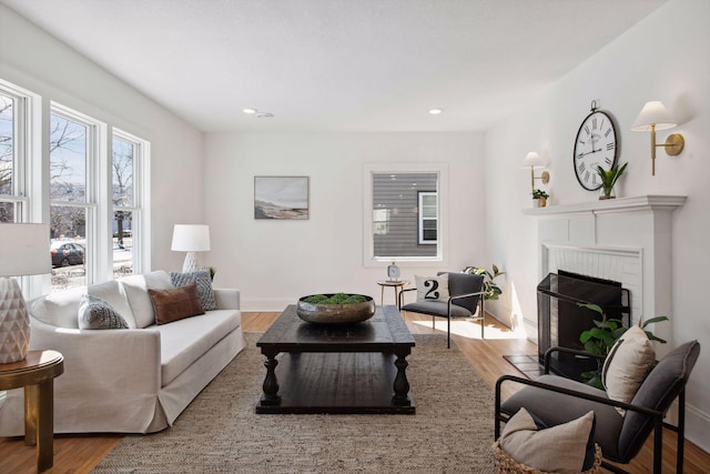 2930 Salem Ave, Saint Louis Park, MN 55416 - living room featuring wood finished floors, a fireplace, recessed lighting, and baseboards