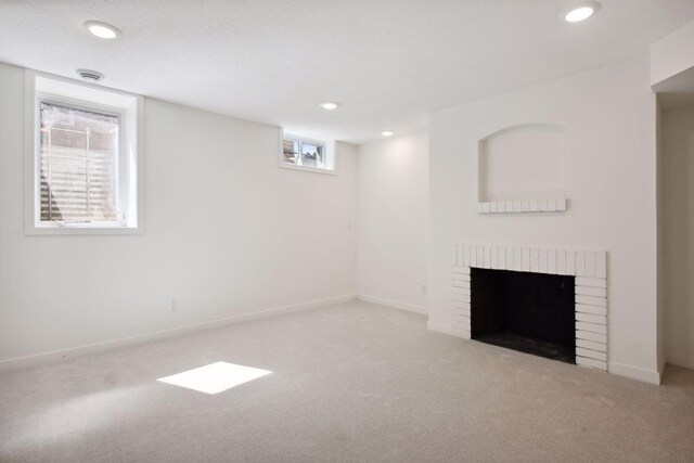 2930 Salem Ave, Saint Louis Park, MN 55416 - basement featuring carpet flooring, a fireplace, recessed lighting, and baseboards