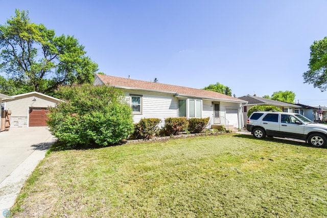 2009 7th St N, Fargo, ND 58102 - single story home with a front lawn and a garage