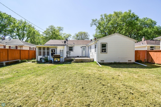 2009 7th St N, Fargo, ND 58102 - rear view of property with a sunroom