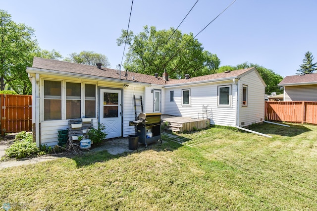 2009 7th St N, Fargo, ND 58102 - rear view of house featuring a deck and roof with shingles