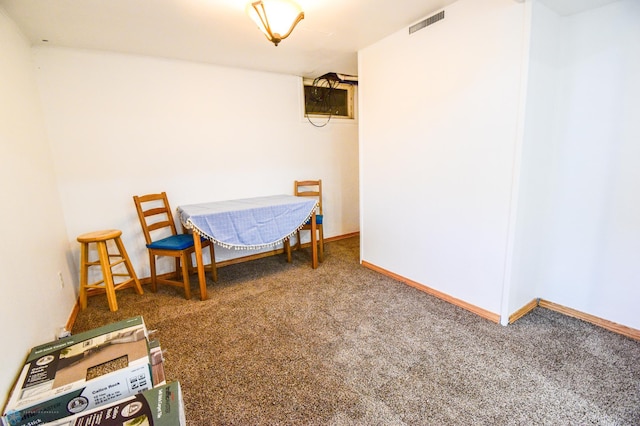 2009 7th St N, Fargo, ND 58102 - carpeted dining space featuring baseboards
