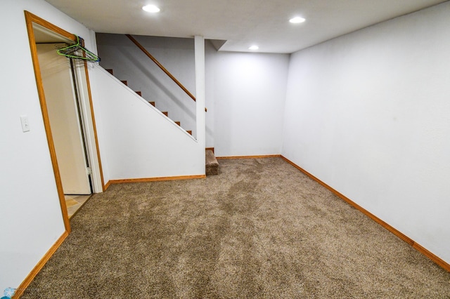 2009 7th St N, Fargo, ND 58102 - finished below grade area featuring carpet flooring, recessed lighting, and stairway