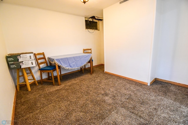 2009 7th St N, Fargo, ND 58102 - dining area with carpet floors and baseboards