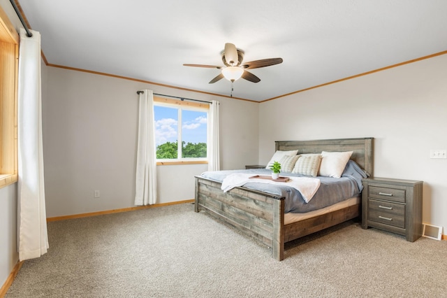 2487 2nd St SW, Buffalo, MN 55313 - bedroom featuring baseboards, ornamental molding, light colored carpet, and a ceiling fan