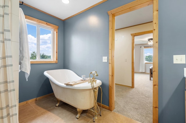 2487 2nd St SW, Buffalo, MN 55313 - full bathroom with baseboards, a freestanding bath, and ornamental molding