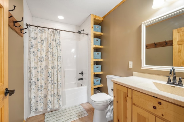 2487 2nd St SW, Buffalo, MN 55313 - bathroom featuring toilet, shower / bath combo with shower curtain, vanity, and tile patterned floors