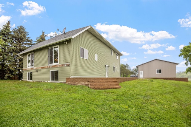 2487 2nd St SW, Buffalo, MN 55313 - view of side of home featuring a lawn