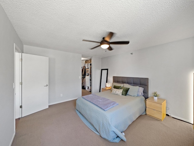401 1st St Unit 601, Minneapolis, MN 55401 - bedroom featuring carpet floors, ceiling fan, a spacious closet, a closet, and a textured ceiling