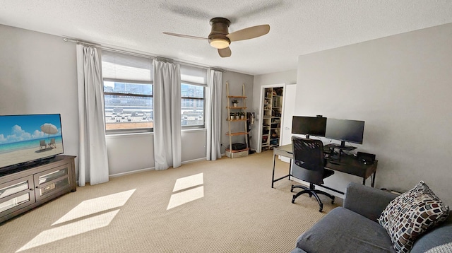 401 1st St Unit 601, Minneapolis, MN 55401 - carpeted home office featuring ceiling fan, a textured ceiling, and baseboards