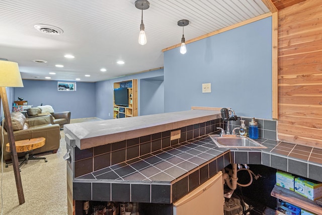 7109 Douglas Dr N, Brooklyn Park, MN 55429 - miscellaneous room with a sink and recessed lighting