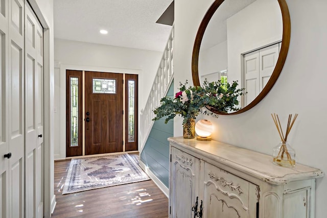 15084 Appaloosa Trl NE, Prior Lake, MN 55372 - foyer entrance with wood finished floors, stairway, a textured ceiling, and recessed lighting