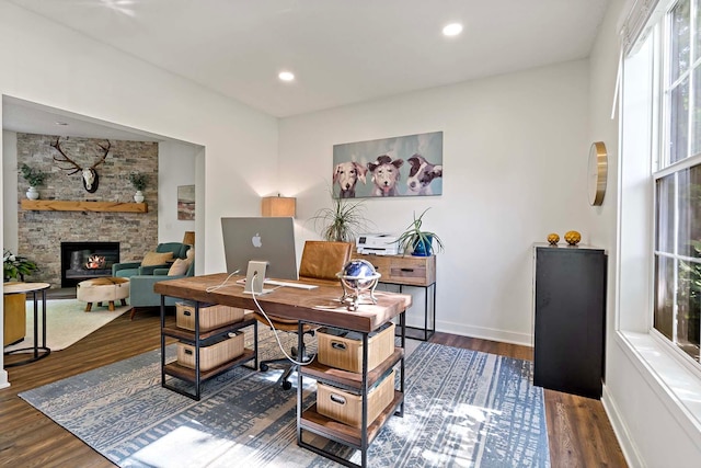 15084 Appaloosa Trl NE, Prior Lake, MN 55372 - office area with healthy amount of natural light, dark wood-style floors, a fireplace, baseboards, and recessed lighting