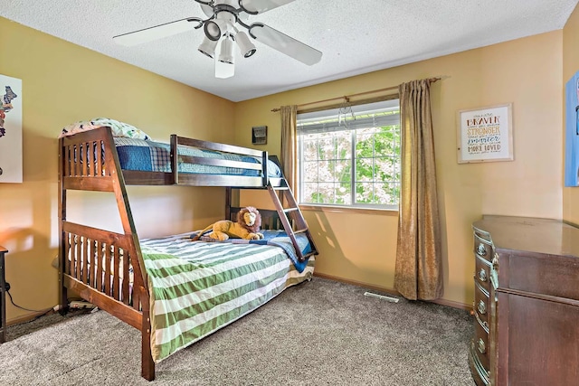 15084 Appaloosa Trl NE, Prior Lake, MN 55372 - carpeted bedroom with a textured ceiling and a ceiling fan