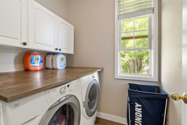 15084 Appaloosa Trl NE, Prior Lake, MN 55372 - laundry area with cabinet space, washer and clothes dryer, and wood finished floors