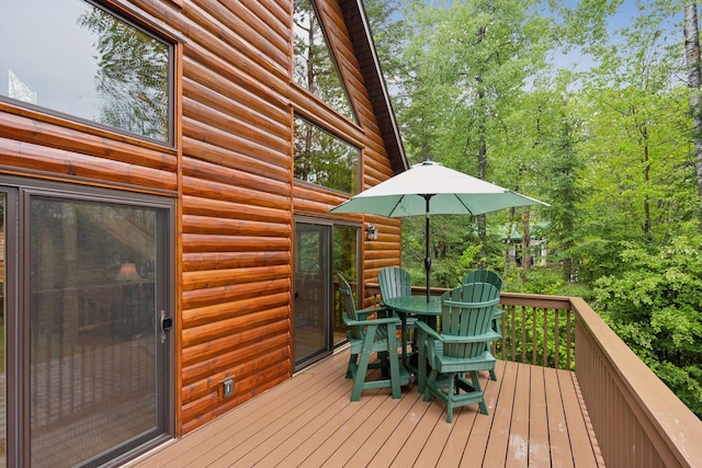 7194 Quentin Rd NE, Outing, MN 56662 - deck featuring outdoor dining area