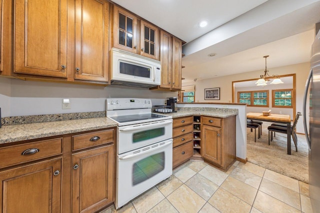 5241 Silver Maple Cir, Minnetonka, MN 55343 - kitchen featuring white appliances, brown cabinetry, a peninsula, pendant lighting, and recessed lighting