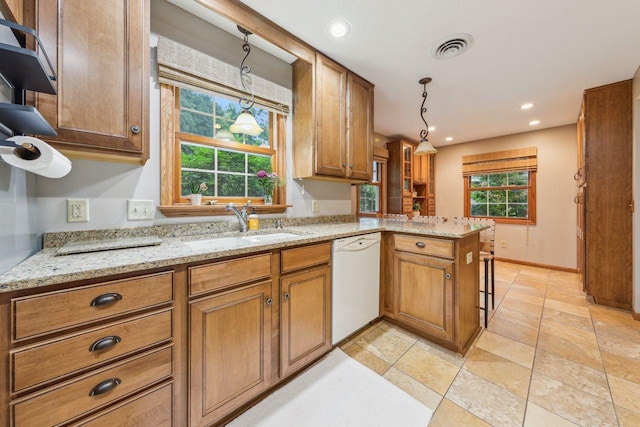 5241 Silver Maple Cir, Minnetonka, MN 55343 - kitchen featuring white dishwasher, brown cabinetry, a peninsula, hanging light fixtures, and recessed lighting
