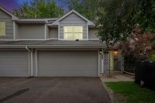 5241 Silver Maple Cir, Minnetonka, MN 55343 - view of property featuring a garage and asphalt driveway