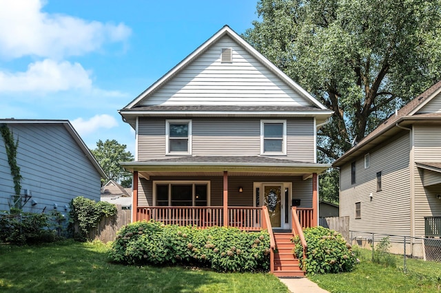 2651 Colfax Ave N, Minneapolis, MN 55411 - american foursquare style home with covered porch and stairway