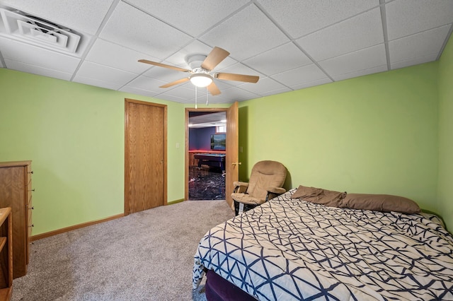 2651 Colfax Ave N, Minneapolis, MN 55411 - carpeted bedroom featuring a ceiling fan, a drop ceiling, and a closet