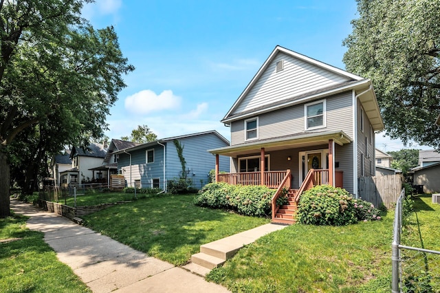 2651 Colfax Ave N, Minneapolis, MN 55411 - traditional style home featuring a porch and stairway