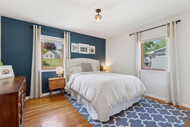 6600 18th St, Saint Louis Park, MN 55426 - bedroom featuring light wood-style floors and baseboards