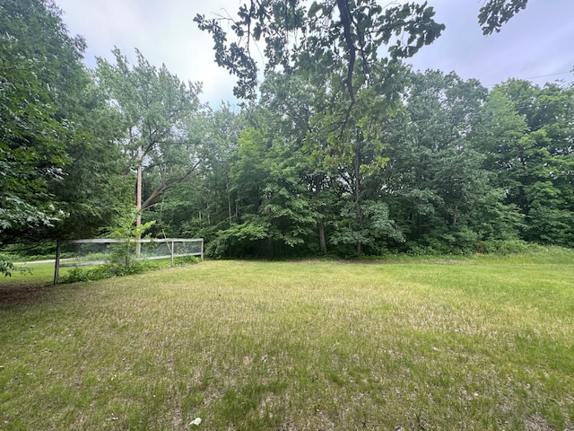22560 Height Of Land Dr, Detroit Lakes, MN 56501 - view of green lawn featuring a wooded view