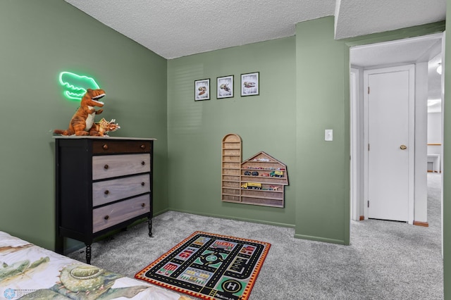 3003 15th Ave S, Moorhead, MN 56560 - carpeted bedroom with a textured ceiling and baseboards