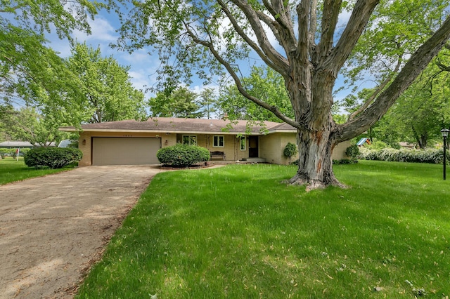 5843 Fairway Ln, Saint Cloud, MN 56303 - ranch-style house with an attached garage, driveway, a front lawn, and brick siding