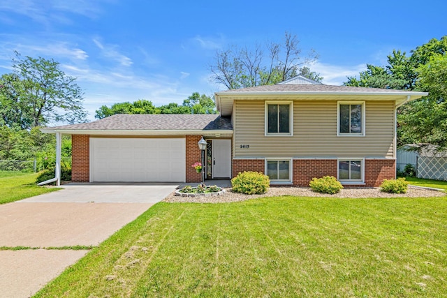 2613 107th Ln NW, Coon Rapids, MN 55433 - tri-level home featuring a garage, driveway, and brick siding