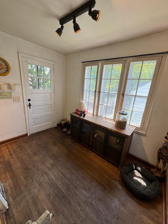 41 17th Ave N, Hopkins, MN 55343 - entryway featuring dark wood-style floors and baseboards
