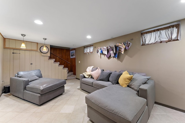 41 17th Ave N, Hopkins, MN 55343 - living room with light tile patterned floors, stairway, recessed lighting, and wood walls