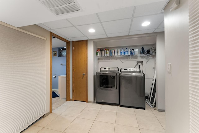 41 17th Ave N, Hopkins, MN 55343 - laundry area with washing machine and clothes dryer, recessed lighting, and light tile patterned floors