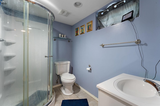 41 17th Ave N, Hopkins, MN 55343 - bathroom with a stall shower, toilet, tile patterned flooring, vanity, and baseboards