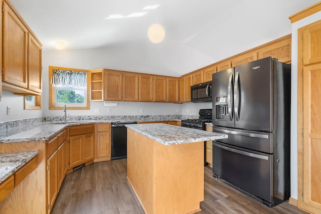 10779 57th St NE, Albertville, MN 55301 - kitchen featuring black appliances, vaulted ceiling, dark wood-type flooring, light stone counters, and a center island