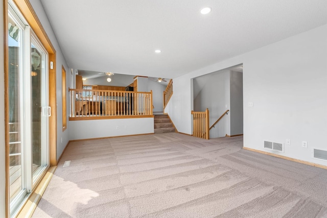10779 57th St NE, Albertville, MN 55301 - empty room with carpet flooring, recessed lighting, and stairway