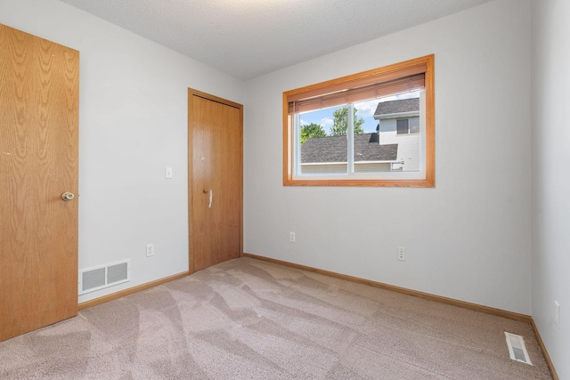 10779 57th St NE, Albertville, MN 55301 - unfurnished bedroom with carpet and a closet